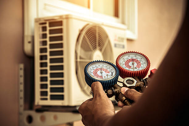 Professional Air Conditioning Service technician working in Westfield, MA